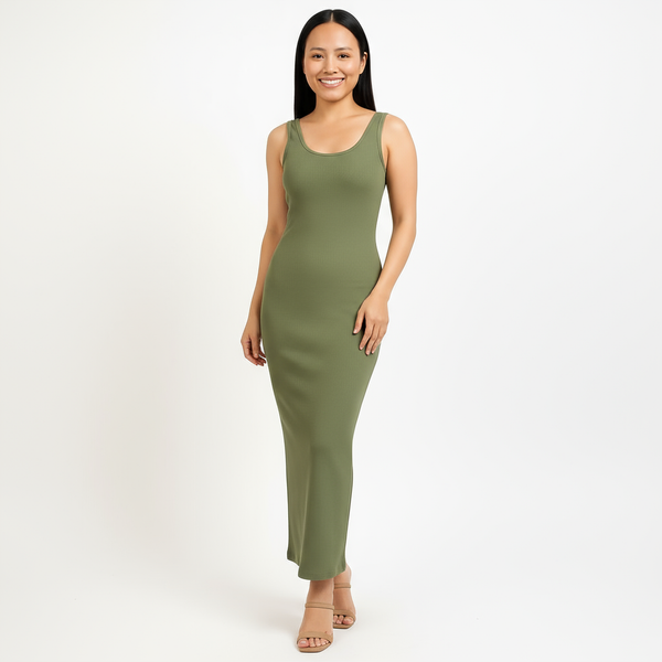 Woman wearing a green sleeveless dress on a white background