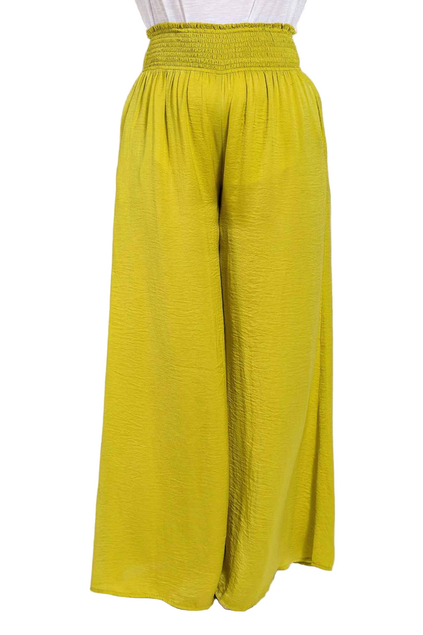 Yellow wide-leg pants on a white background